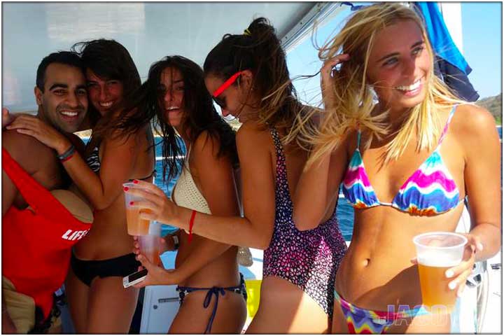 4 gitls and 1 guy having partying on catamaran