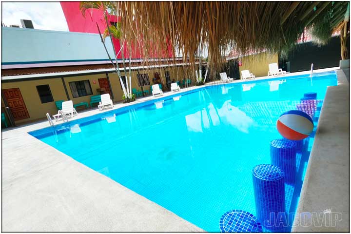 Exterior view of pool and rooms