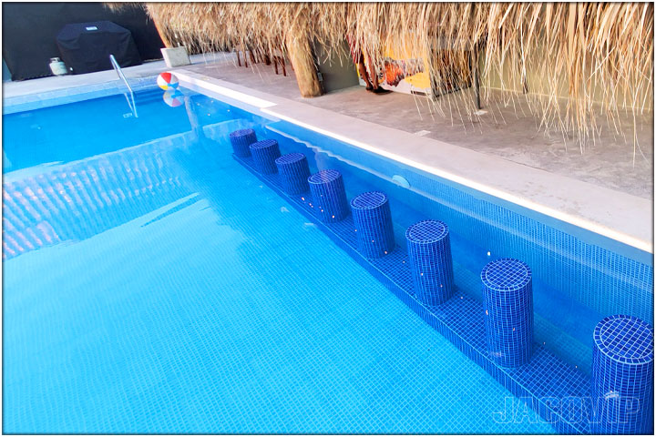 Swim up bar stools in pool