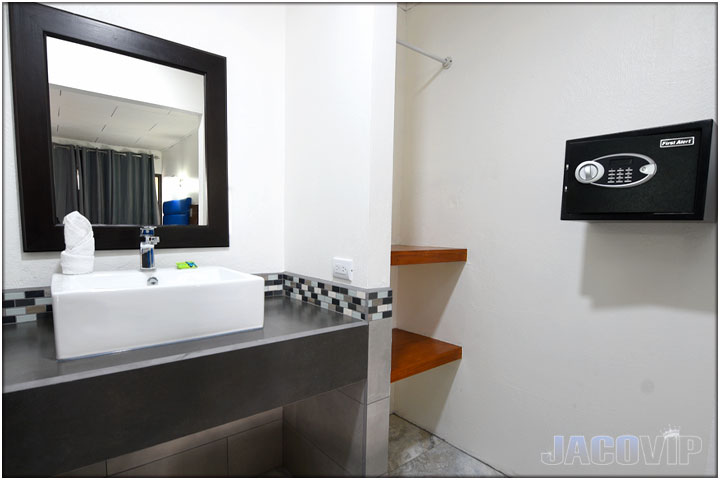 Bathroom sink, shelves and safe box