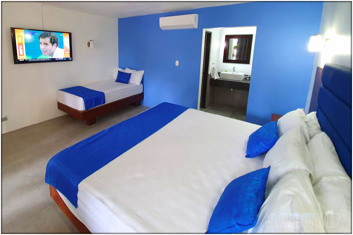 Bedroom with 2 beds plus TV