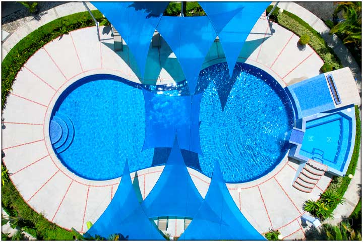 Direct overhead view of swimming pool at blue macaw