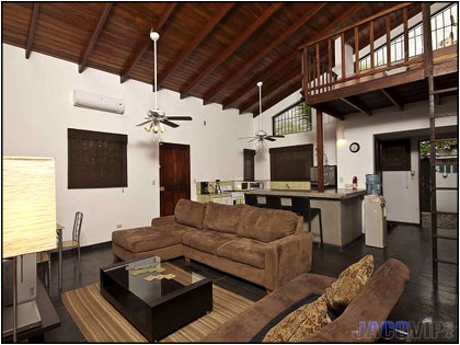 spacious living room with loft area