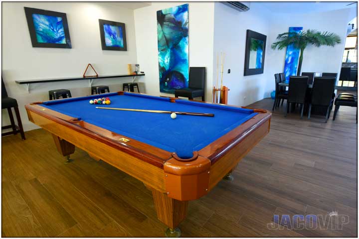 Pool table with blue carpet