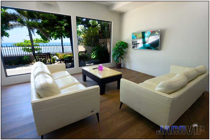 White sofas with ocean views