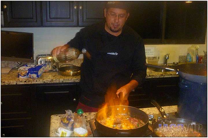 Chef cooking  with flames