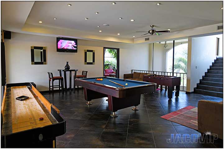 Casa Ponte game room area on second floor with foosball, pool table and more
