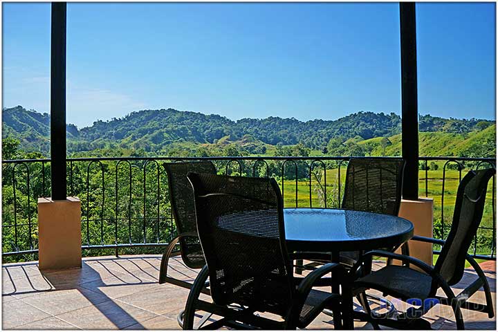 Small seating area on second floor balcony