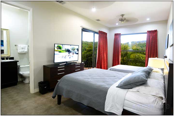 Bedroom with TV and mountain views