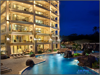 Building and pool light up at night