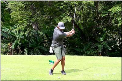 Man playing golf at La Iguana Golf Course in Los Sueños Costa Rica
