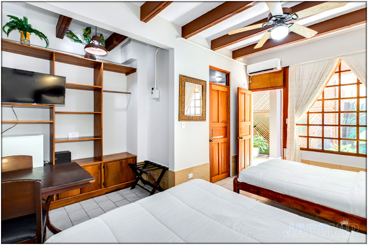 King size bed and open door