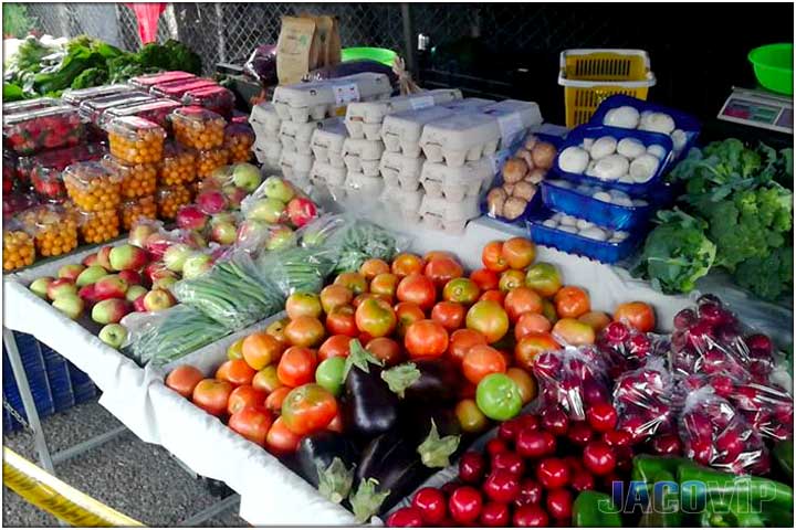 Farmers market with fresh fruits and vegetables
