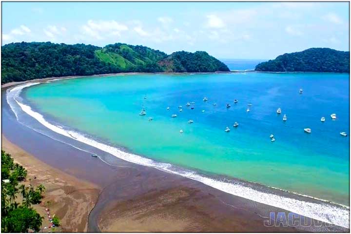 Drone photo of boats in the bay at Herradura Beach in Costa Rica