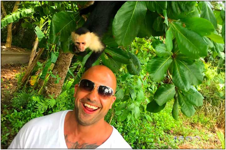 Guy with monkey at Manuel Antonio National Park