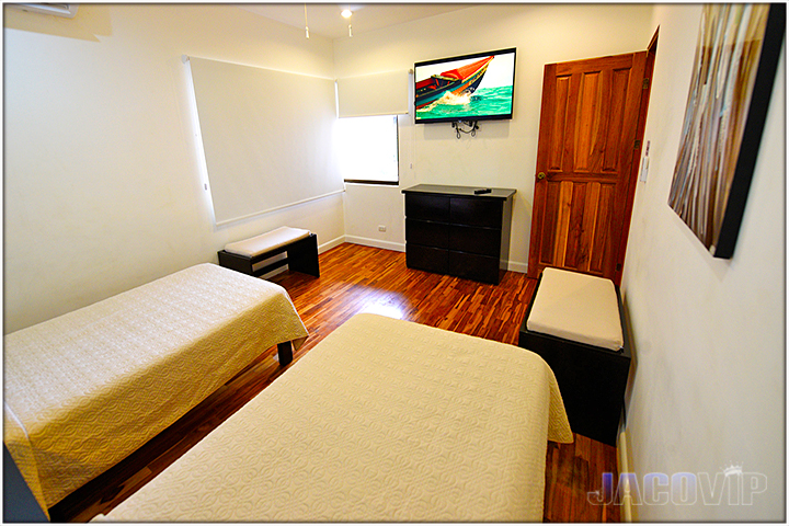 2nd floor bedroom with 2 single beds