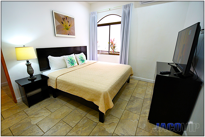 Queen size bed in bedroom