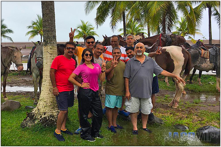 Group with Concierge and Horses on Jaco Beach