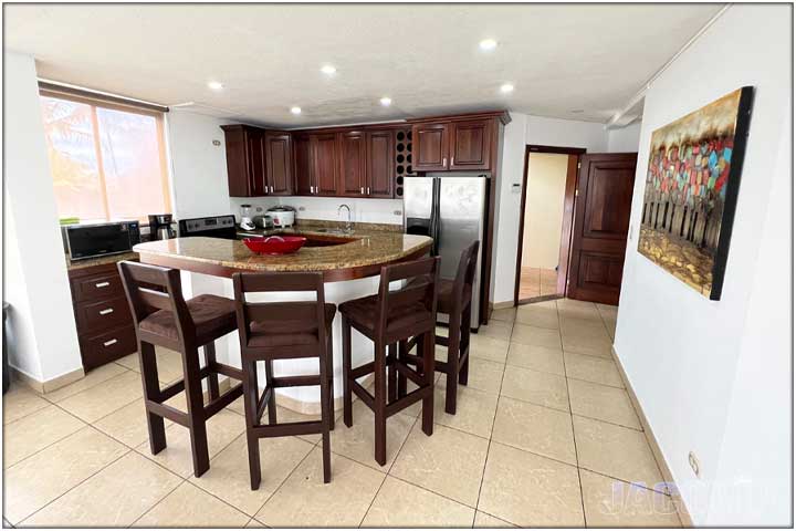 2 dining tables with white table cloths