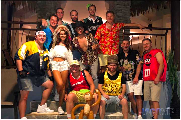 Bachelor party group and vip concierge dressed up for Halloween party.
