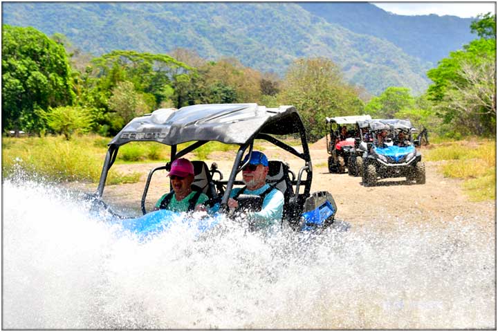 Family driving UTVs after zipline combo tour