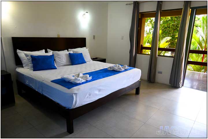 Blue accessories on king size bed