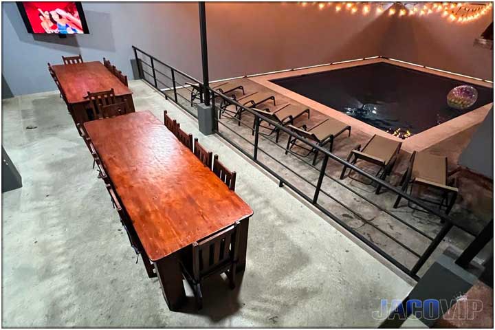 2 long tables with TV under the rancho
