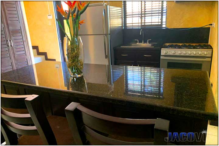 Kitchen island with black granite