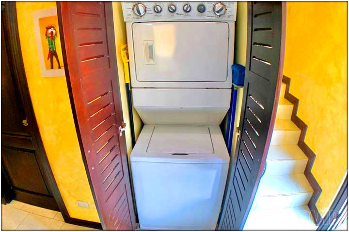 Stackable washer and dryer in a closet