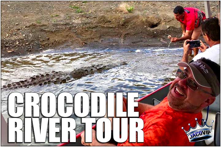 Guy feeding crocodile at Tarcoles River tour
