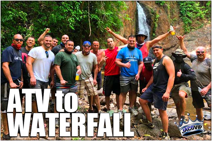 Group of guys posing in front of waterfall in Jaco Costa Rica
