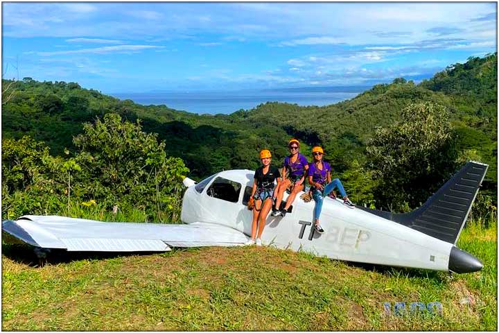 3 jaco vip concierges on airplane wing in costa rica
