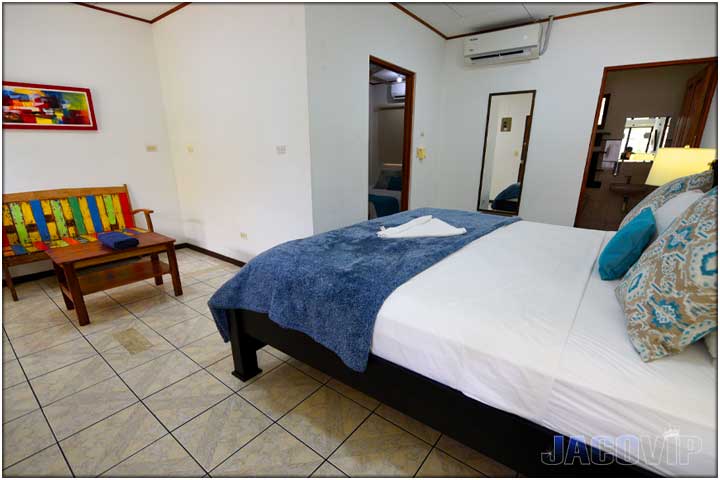 small seating area in entrance of bedroom