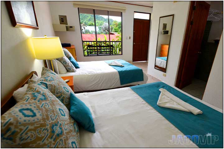 Looking out window from other side of bed