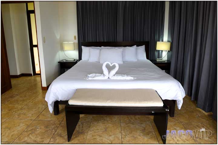 Straight on view of king bed in room 11