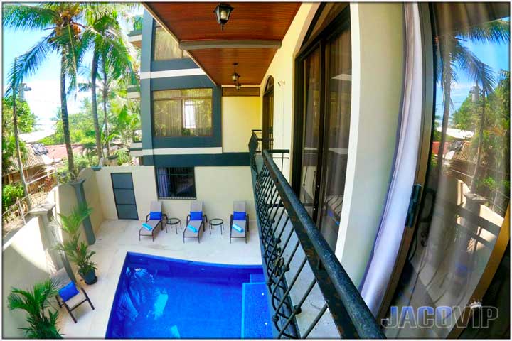 View of swimming pool and jaco beach from Pacific Palms bedroom