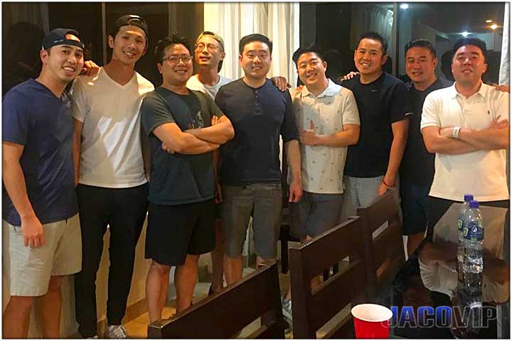 Group of guys in front of dining tables