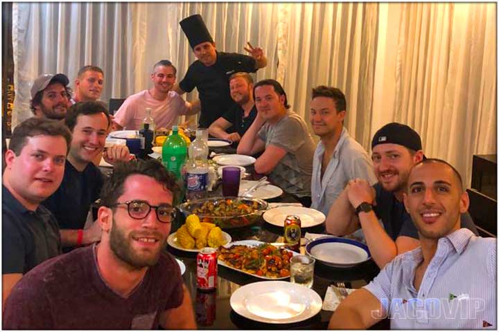 Jaco VIP Chef with bachelor party group about to eat dinner