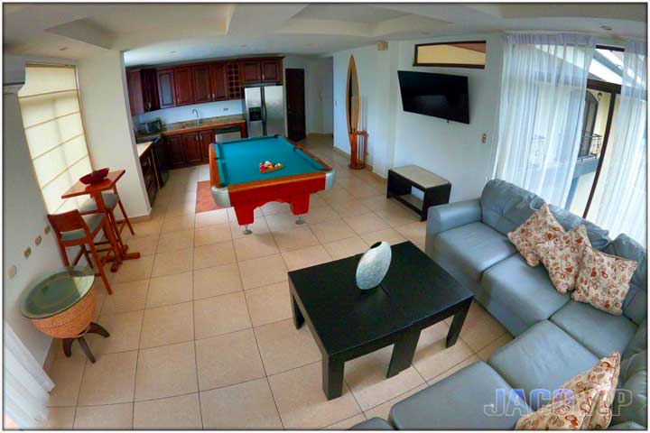 Living Room wide angle photo of living room at pacific palms taken from upper corner of room