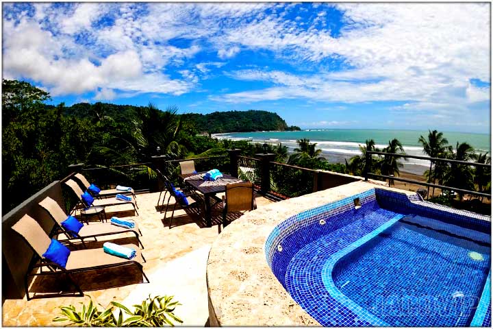 View of rooftop patio with mountains and Jaco beach