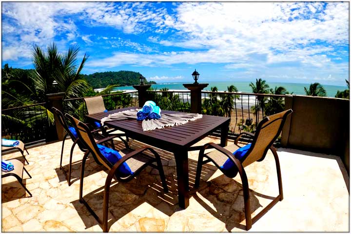Table and chairs on rooftop deck