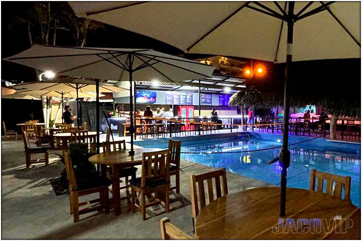 Nightime view of outdoor tables and chairs