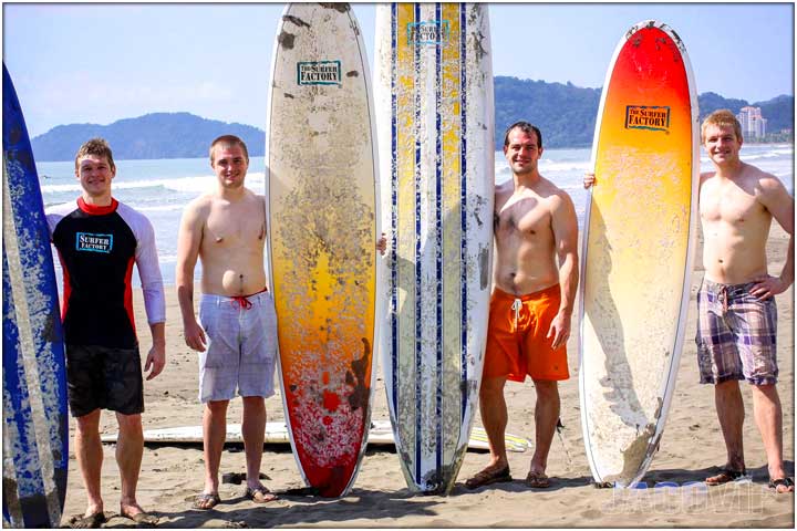 guys with surfboards in Jaco