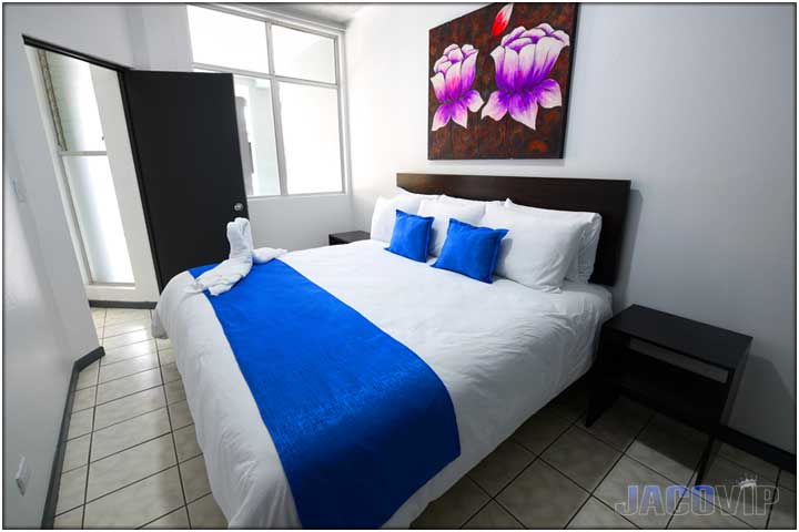 Corner angle photo of bed in bedroom