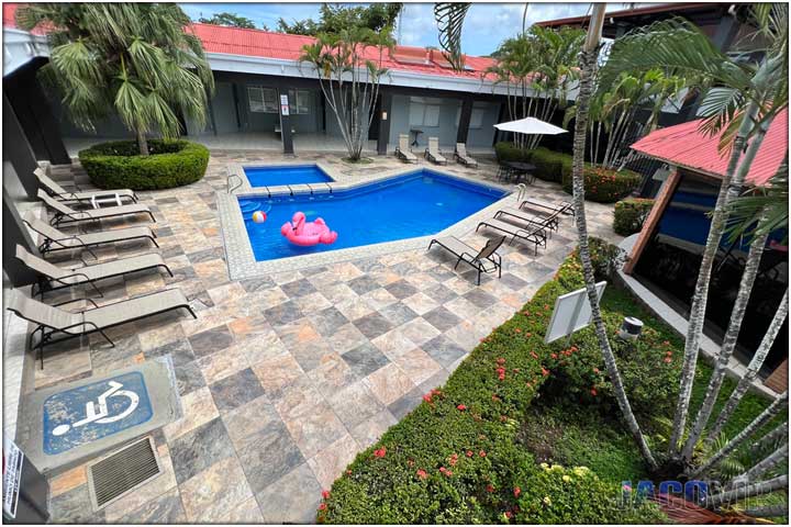 Sunny day with blue skies and swimming pool