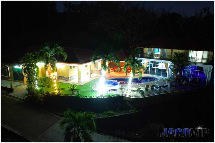 Night time drone photo of villa los amigos in jaco