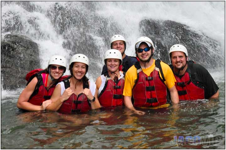 In the river in front of waterfall
