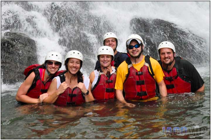 In the river in front of waterfall