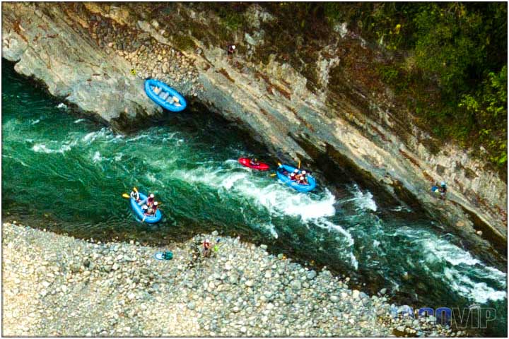 Overhead view of rafts on river