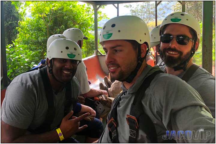 Guys on tractor at zipline tour